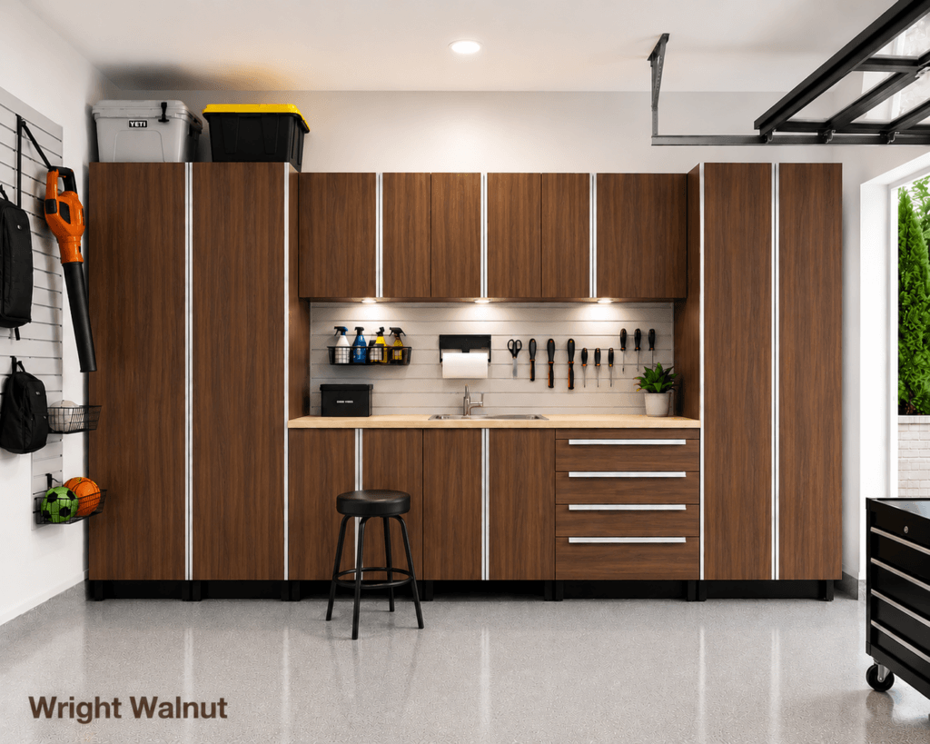 Wright Walnut garage cabinets with continuous aluminum handles, tall storage cabinets, drawers and built-in workbench.